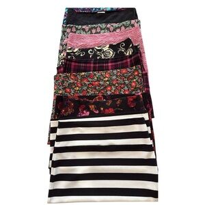 Group of 9 XS and Small LulaRoe skirts in various colors and patterns